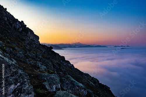 The Andes Mountains shrouded in fog create a mystical and ethereal atmosphere. As the mist weaves through the peaks and valleys, it adds an element of mystery.