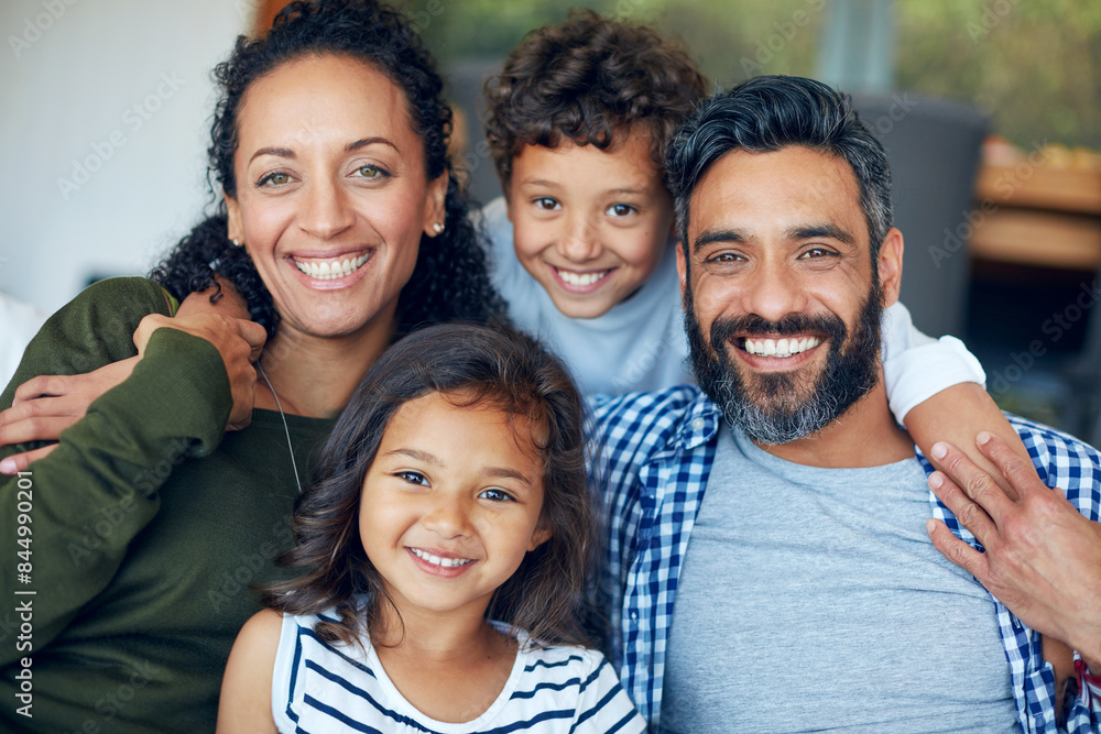 Happy, family and hug portrait with kids and parents together with smile and bonding in home. Mother, father and embrace kid with youth, fun and lounge couch with laugh and care in house with love Happy, family and hug portrait with kids and parents together with smile and bonding in home. Mother, father and embrace kid with youth, fun and lounge couch with laugh and care in house with love