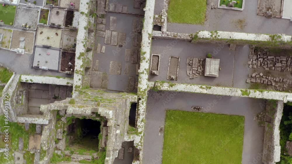 Claregalway Friary top down view from above rotating and rising to establish a bird's eye view Claregalway Friary top down view from above rotating and rising to establish a bird's eye view