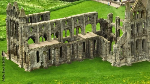 7th-century Christian monastery Of Whitby Abbey In North Yorkshire, England. Aerial Shot photo
