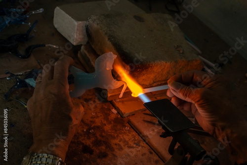 Discover the Artistry and Tradition of Glassblowing in Venice. A Masterful Display of Handmade Craftsmanship, Precision and Creativity by Skilled Artisans in Murano's Renowned Glass Workshops © GERMANALBERTO