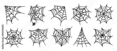 Spider web vector icon set. A thin cobweb with an insect inside, a corner web. Gothic Halloween decoration, scary sticky heart shaped trap. Black and white hand drawn doodle. Hanging symbol of fear
