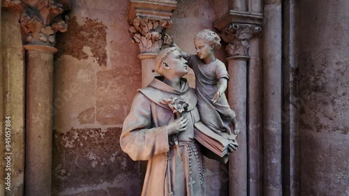 Saint Anthony statue in Saint Julien cathedral, Le Mans, France. Backward shot
