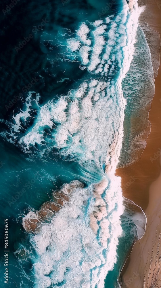 Aerial View of Gentle Waves Lapping Against the Shoreline Aerial View of Gentle Waves Lapping Against the Shoreline
