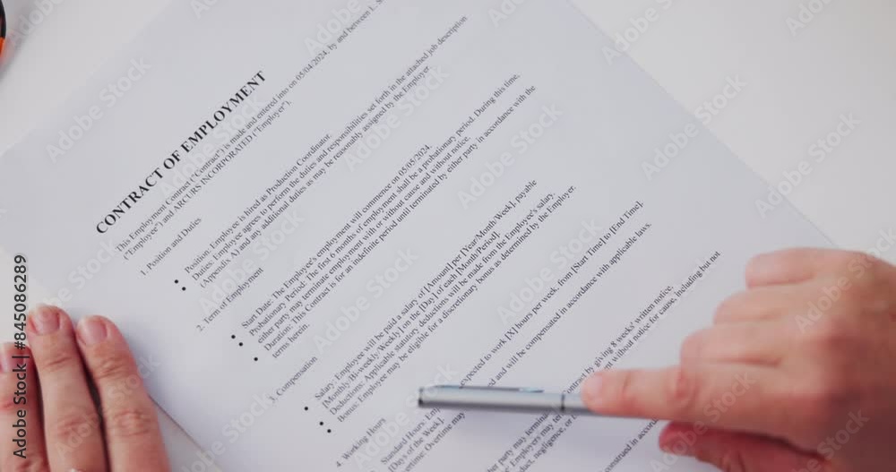 Person, hands and reading paperwork with contract of employment for recruitment or agreement application. Closeup, employee and document with information for job rules, hiring process or legal policy Person, hands and reading paperwork with contract of employment for recruitment or agreement application. Closeup, employee and document with information for job rules, hiring process or legal policy