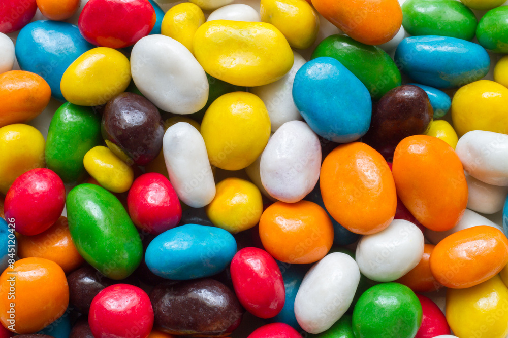 Bright multi-colored candies dragee. Texture of sweets and confectionery. Bright multi-colored candies dragee. Texture of sweets and confectionery.