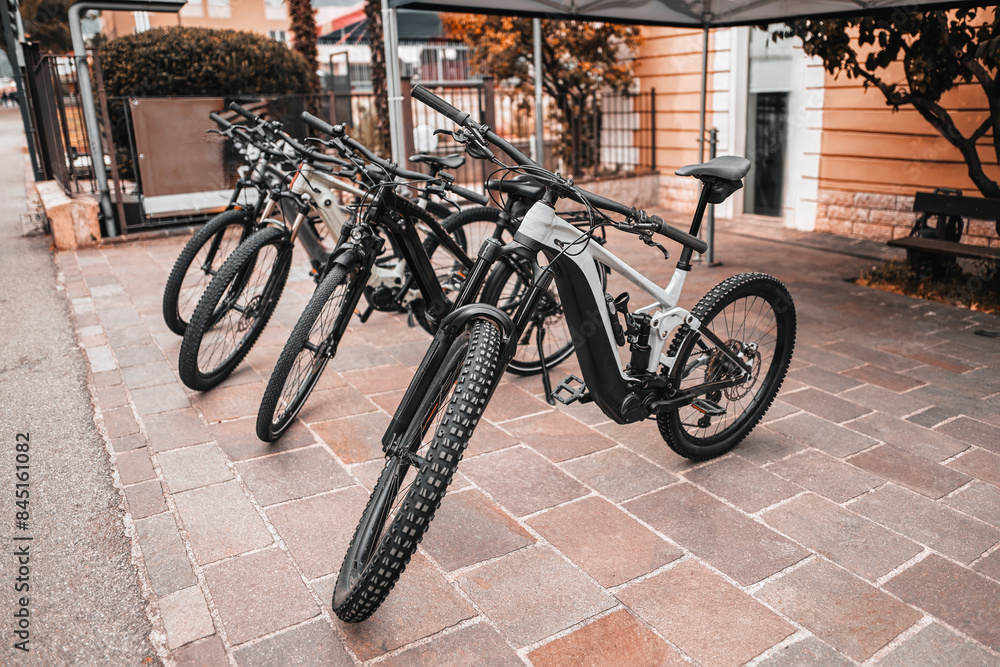 Electric Bikes Parked Outside Urban Shop Electric Bikes Parked Outside Urban Shop