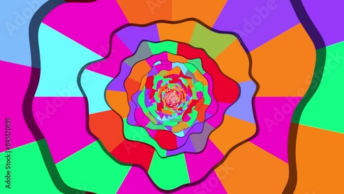 Moving through wavy rings with colorful rays. Seamless loop