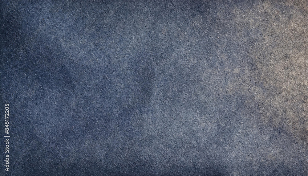 Handmade paper with a aged, rough, grainy, distressed texture in earthy blue tones with visible fibers, art rustic backgrounds. Handmade paper with a aged, rough, grainy, distressed texture in earthy blue tones with visible fibers, art rustic backgrounds.