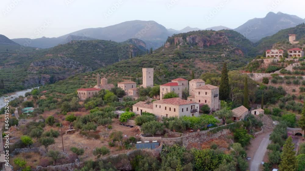4K aerial - a bird's eye view video (Ultra High Definition) of Mourtzinos Tower. Captivating evening cityscape of Kardamyli town, region of Messenia on Mani Peninsula, Greece. 4K aerial - a bird's eye view video (Ultra High Definition) of Mourtzinos Tower. Captivating evening cityscape of Kardamyli town, region of Messenia on Mani Peninsula, Greece.