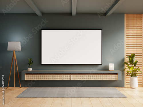 Smart TV on the dark blue wall in living room minimal design- 3D rendering.