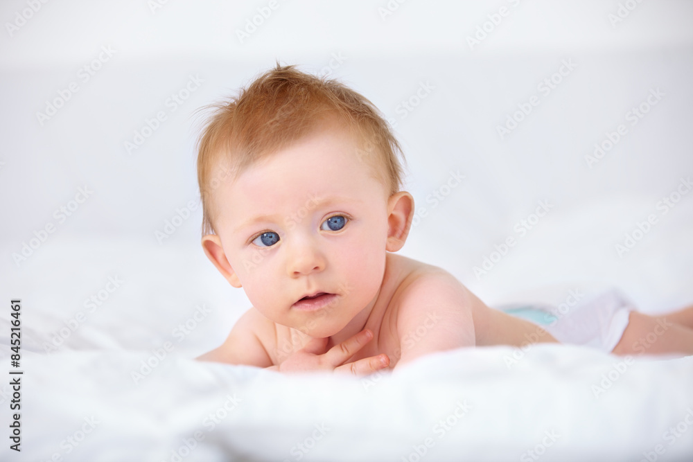 Cute baby, home and relax for laying down, nappy and comfy for child development and growth. Infant, bed and newborn with blue eyes, house and white bedding for nap time after bath in night routine Cute baby, home and relax for laying down, nappy and comfy for child development and growth. Infant, bed and newborn with blue eyes, house and white bedding for nap time after bath in night routine
