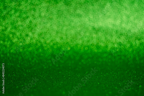 A green background with a blurry green background