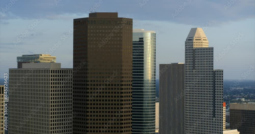 Drone view of skyscrapers in downtown Houston, Texas during sunset Drone view of skyscrapers in downtown Houston, Texas during sunset