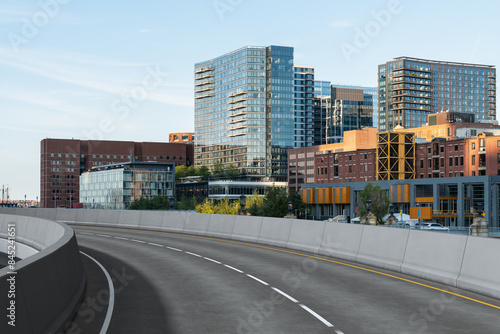 Empty urban asphalt road exterior with city buildings background. New modern highway concrete construction. Concept of way to success. Transportation logistic industry fast delivery. Boston. USA. photo