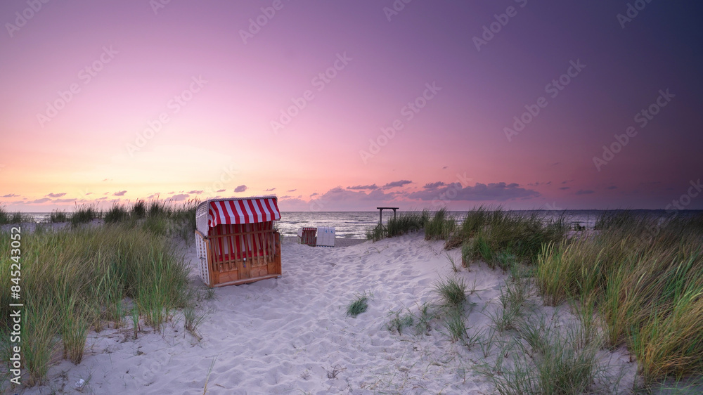 beach hut standing at sandy beach near the sea in sunset light beach hut standing at sandy beach near the sea in sunset light