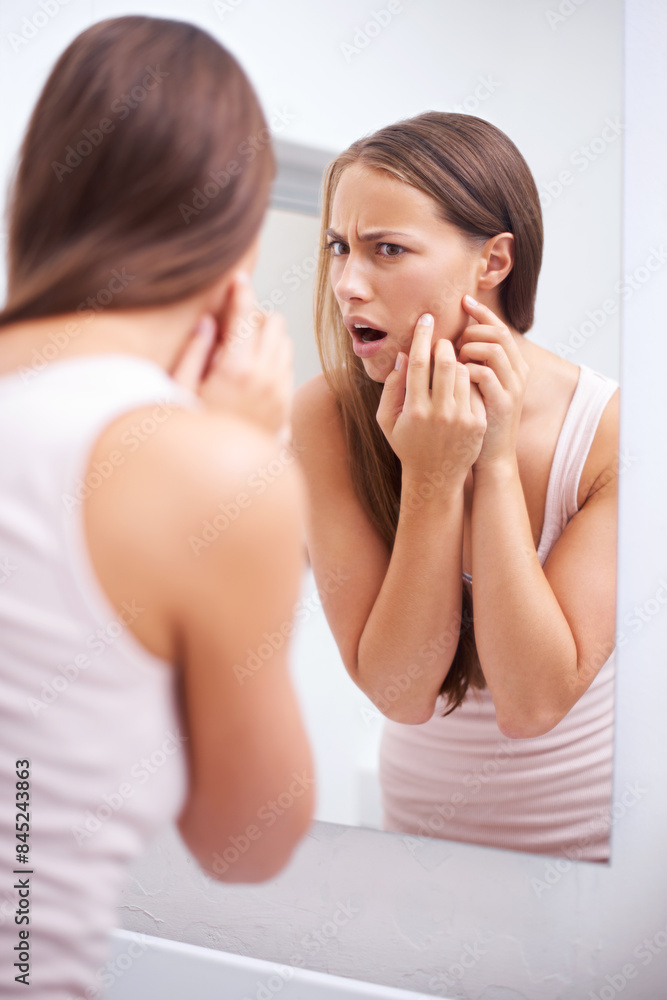 Shock, mirror and woman pop pimples in bathroom for skincare, health or wellness face routine. Upset, beauty and female person pressing zit or acne for facial dermatology treatment at apartment. Shock, mirror and woman pop pimples in bathroom for skincare, health or wellness face routine. Upset, beauty and female person pressing zit or acne for facial dermatology treatment at apartment.