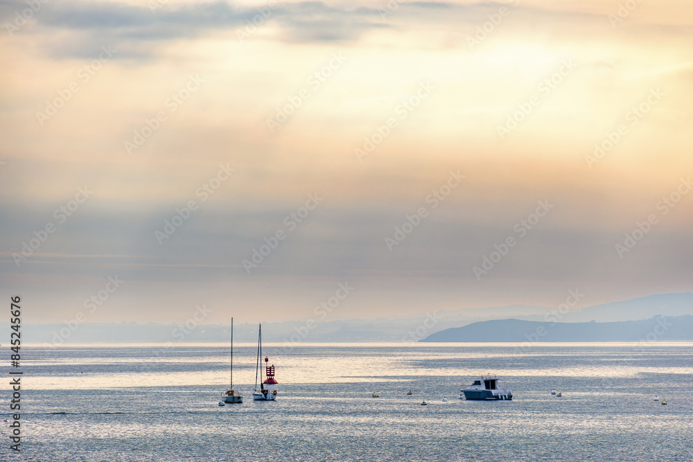 Seascape view with boats on the sea in morning light Seascape view with boats on the sea in morning light