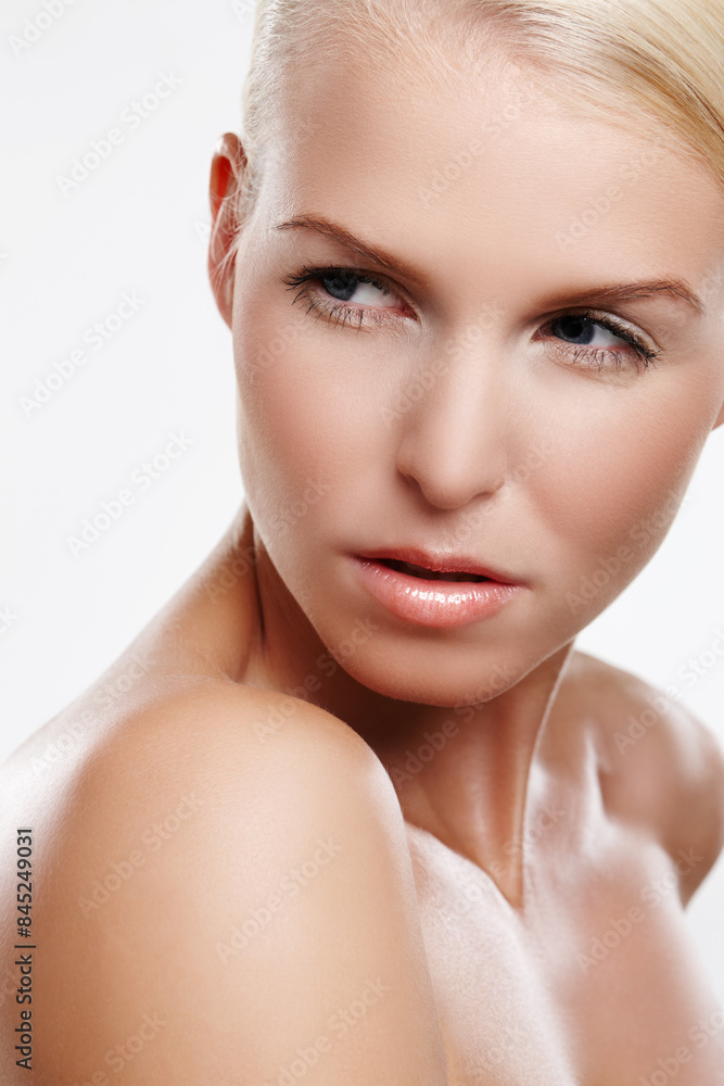 Woman, serious and confident cosmetic in studio, makeup and skincare on white background. Female person, beauty and proud of dermatology foundation results, hydration and facial treatment or soft Woman, serious and confident cosmetic in studio, makeup and skincare on white background. Female person, beauty and proud of dermatology foundation results, hydration and facial treatment or soft