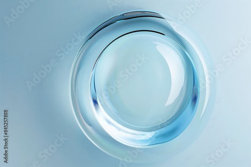 Circle shape in glass effect on blue color background for product presentation.
