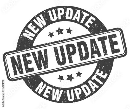 new update stamp. new update label. round grunge sign
