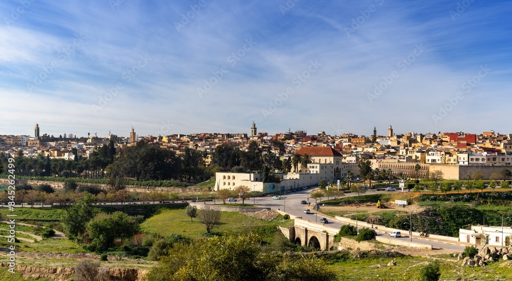 panorama cityscape of the old town of Meknes with minarets and the old city walls panorama cityscape of the old town of Meknes with minarets and the old city walls