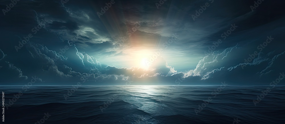 A stunning seascape with ominous dark clouds a radiant sun emerging from the horizon and distant ships creating a divine and dramatic copy space image