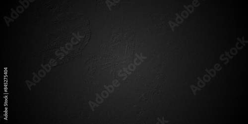 Dark Black background texture, old vintage charcoal black backdrop paper with watercolor. Abstract background with black wall surface, black stucco texture. Black gray satin dark texture luxurious.