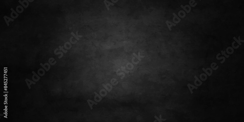 Dark Black background texture, old vintage charcoal black backdrop paper with watercolor. Abstract background with black wall surface, black stucco texture. Black gray satin dark texture.