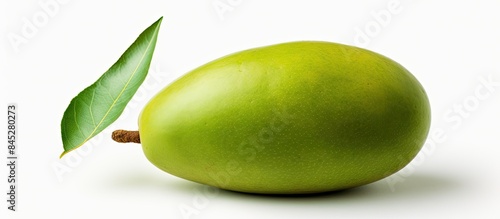 Wallpaper Mural A single raw green mango with its stem is captured in a close up view The mango symbolizing natural tropical food is isolated on a white background This image is perfect for food related concepts wit Torontodigital.ca