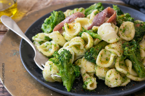 Orecchiette pasta with broccoli, anchovies and chilli pepper, traditional Italian dish from the Puglia region