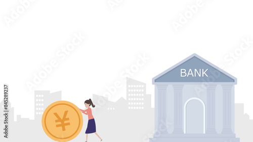 銀行から急いでお金を引出す若い女性