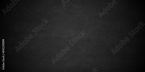 Dark Black background texture, old vintage charcoal black backdrop paper with watercolor. Abstract background with black wall surface, black stucco texture. Black gray satin dark texture.
