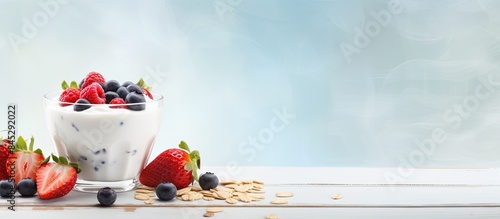 Enjoy a delightful morning meal of corn flakes paired with creamy milk and topped off with a delectable berry jam Capture the essence of this delicious breakfast with a captivating copy space image photo