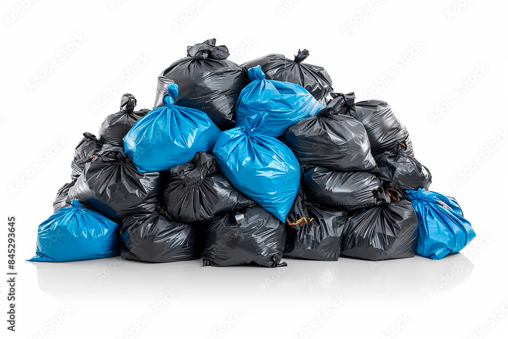 A large pile of garbage in black blue garbage bags isolated on a white background A large pile of garbage in black blue garbage bags isolated on a white background