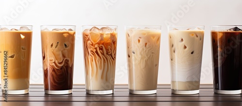 The menu offers a variety of coffee options including the choice between a regular coffee or a dirty coffee with iced milk These beverages can be enjoyed on a white table with a tree pot with the opt