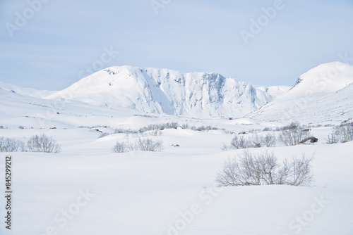 Norwegian high mountains in the snow. Mountains covered with snow. Scandinavia