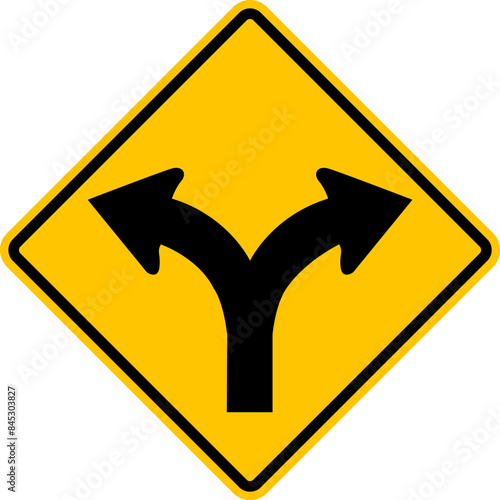 Sign fork in the road. Road fork point. The road splits. Warning yellow road sign. Turn left or right. Diamond road sign. Rhombus road sign.
