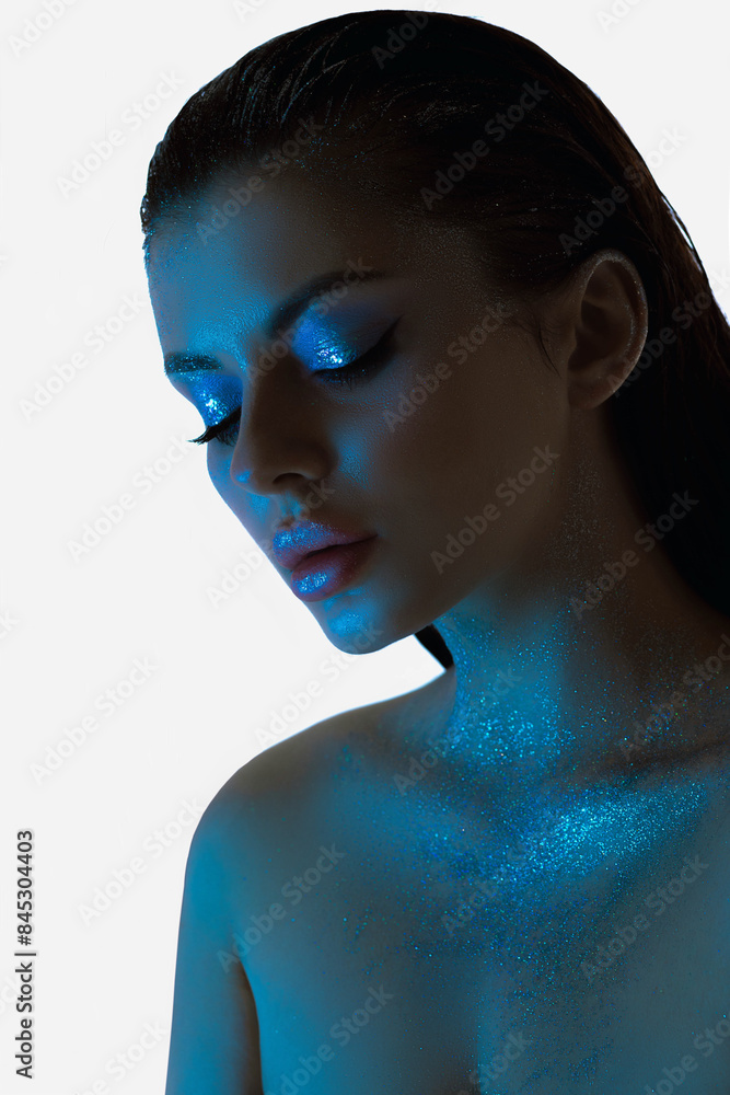 Fototapeta premium Beauty young womans profile, soft blue light, makeup face cosmetic