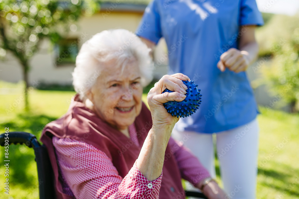 © Halfpoint - Female caregiver doing motorized exercises with senior woman in wheelchair. Nurse and elderly woman squeezing small, soft ball. © Halfpoint - Female caregiver doing motorized exercises with senior woman in wheelchair. Nurse and elderly woman squeezing small, soft ball.
