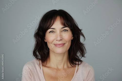 Wallpaper Mural A close up portrait of a woman with a subtle smile Torontodigital.ca