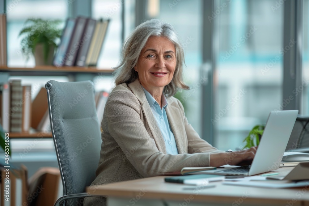 portrait of a businesswoman working on a laptop