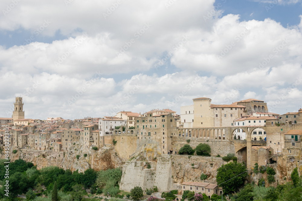 Medieval Pitigliano town over tuff rocks in province of Grosseto, Tuscany, Italy. Medieval Pitigliano town over tuff rocks in province of Grosseto, Tuscany, Italy.