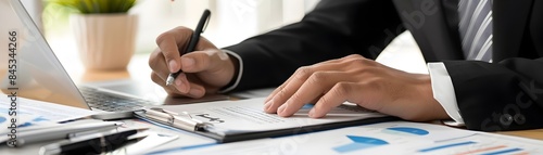 Startup Founder Reviewing F...
