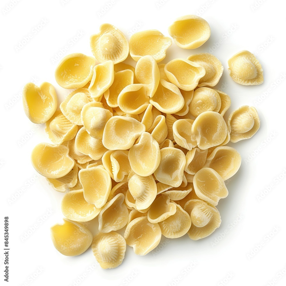 Raw Orecchiette pasta isolated on white background. Raw Orecchiette pasta isolated on white background.
