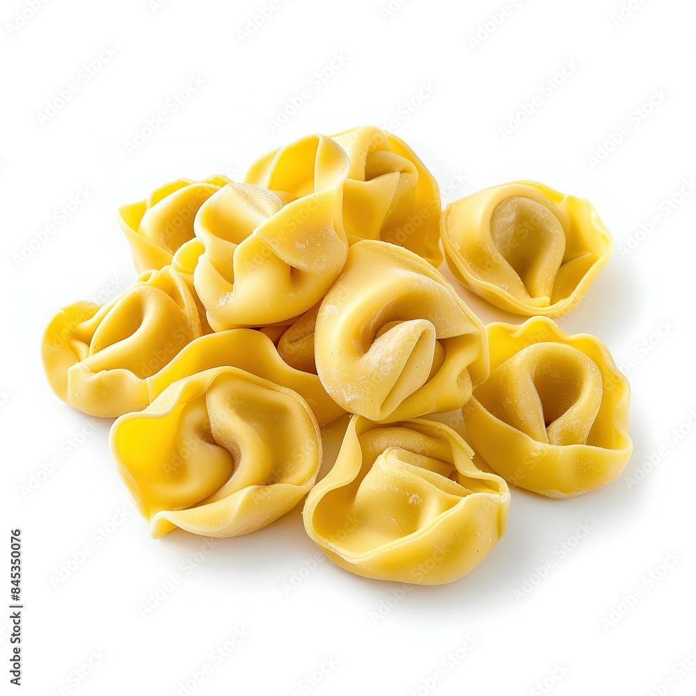 Tortellini stuffed pasta isolated on white background, closeup. Tortellini stuffed pasta isolated on white background, closeup.