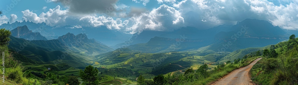 Majestic Mountain Panorama: Awe-Inspiring Peaks, Lush Valleys, and Winding Road Through Scenic Landscape Majestic Mountain Panorama: Awe-Inspiring Peaks, Lush Valleys, and Winding Road Through Scenic Landscape
