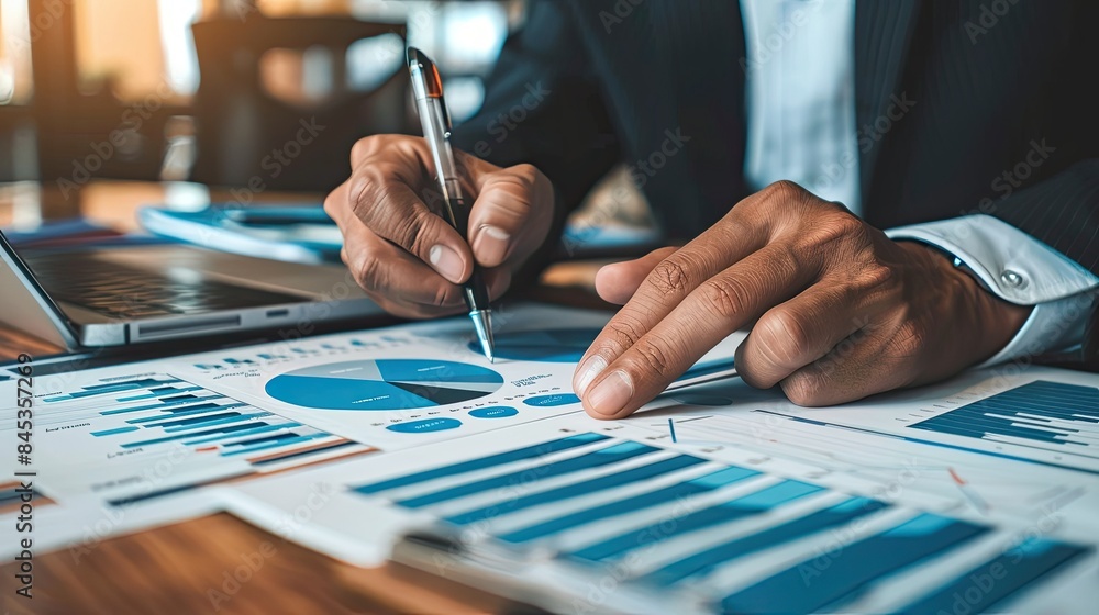 business, finance and investment concept. Businessman analyzing market data business, finance and investment concept. Businessman analyzing market data