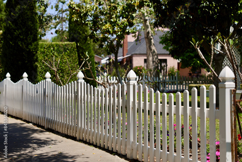 Fotografie charming white picket fence around the yard