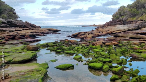Royal national park is nature of Green moss rocks and cliff with ocean at Royal national park coastal walk in Sydney NSW Australia - Footage Landscape Nature travel track from Wattamolla. photo